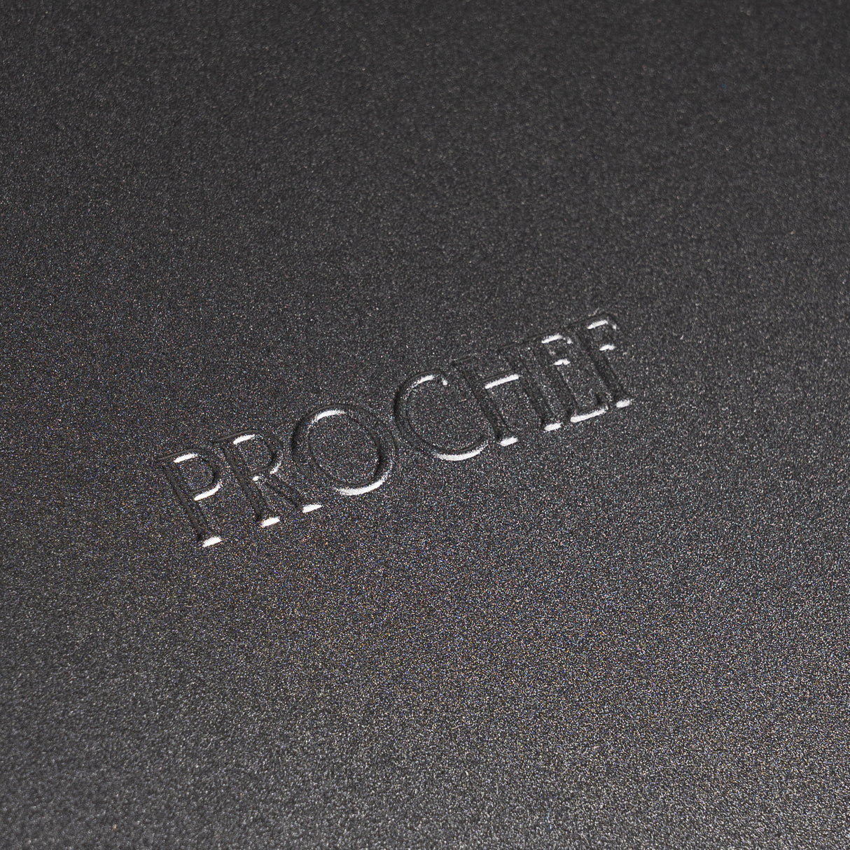 Embossed 'ProChef' logo on black carbon steel ovenware