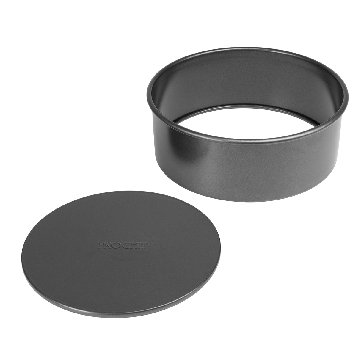 Black cake pan and round loose base on a white background