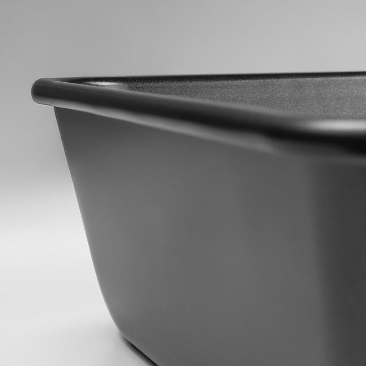 Close-up of a dark grey roasting tin