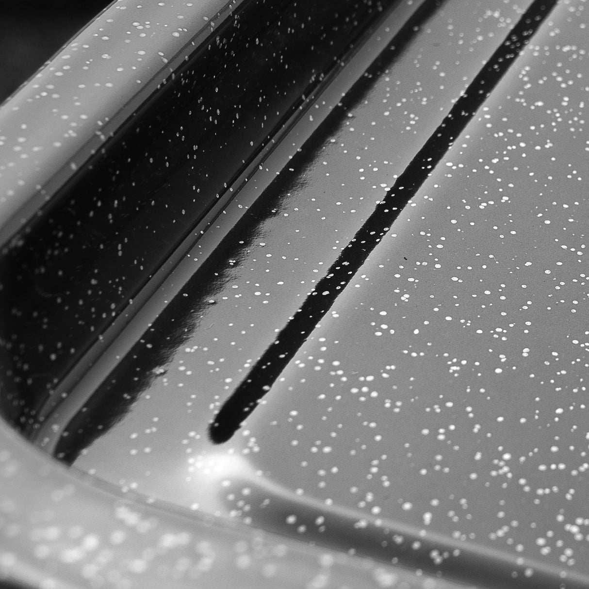 Close-up of grey speckled enamel roasting tin with a glossy finish