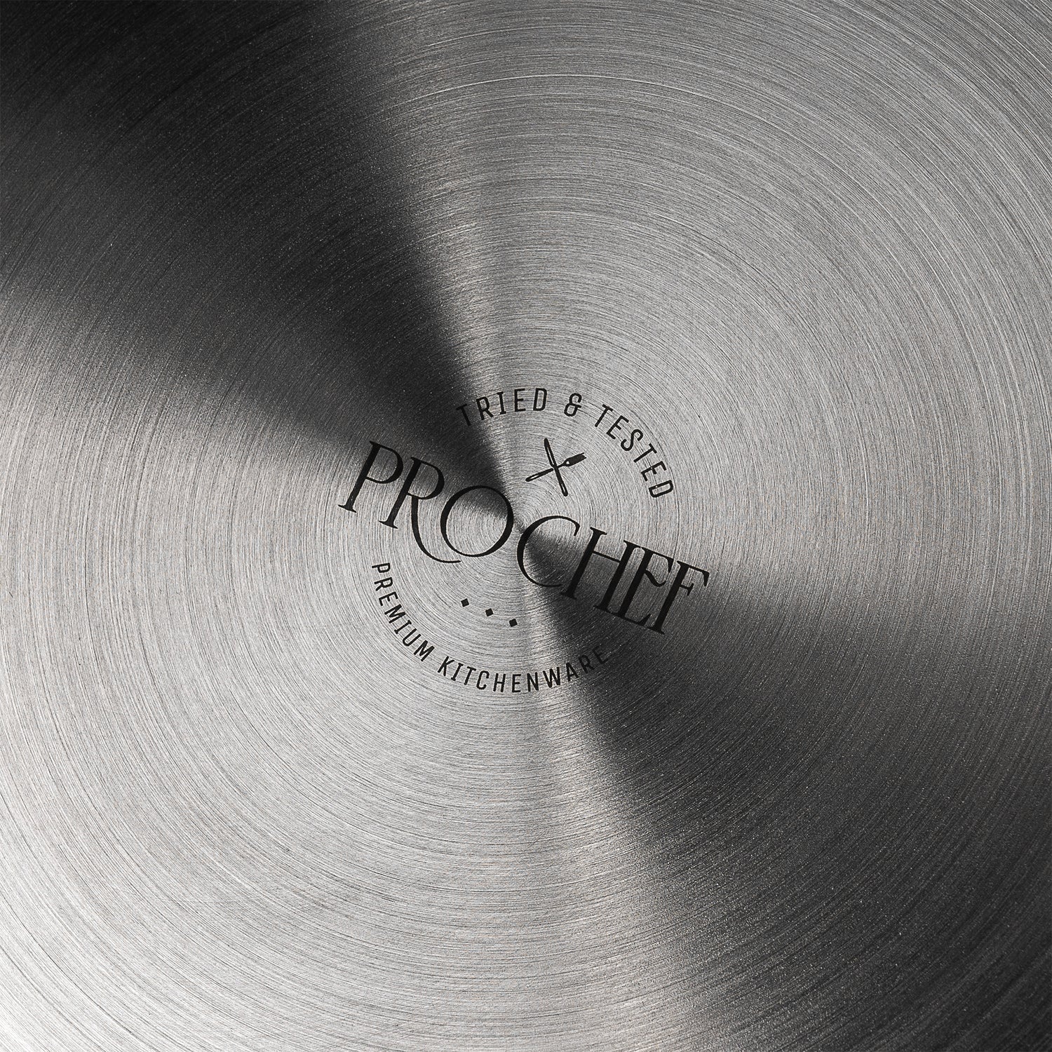Prochef logo on a brushed metal pan base surface