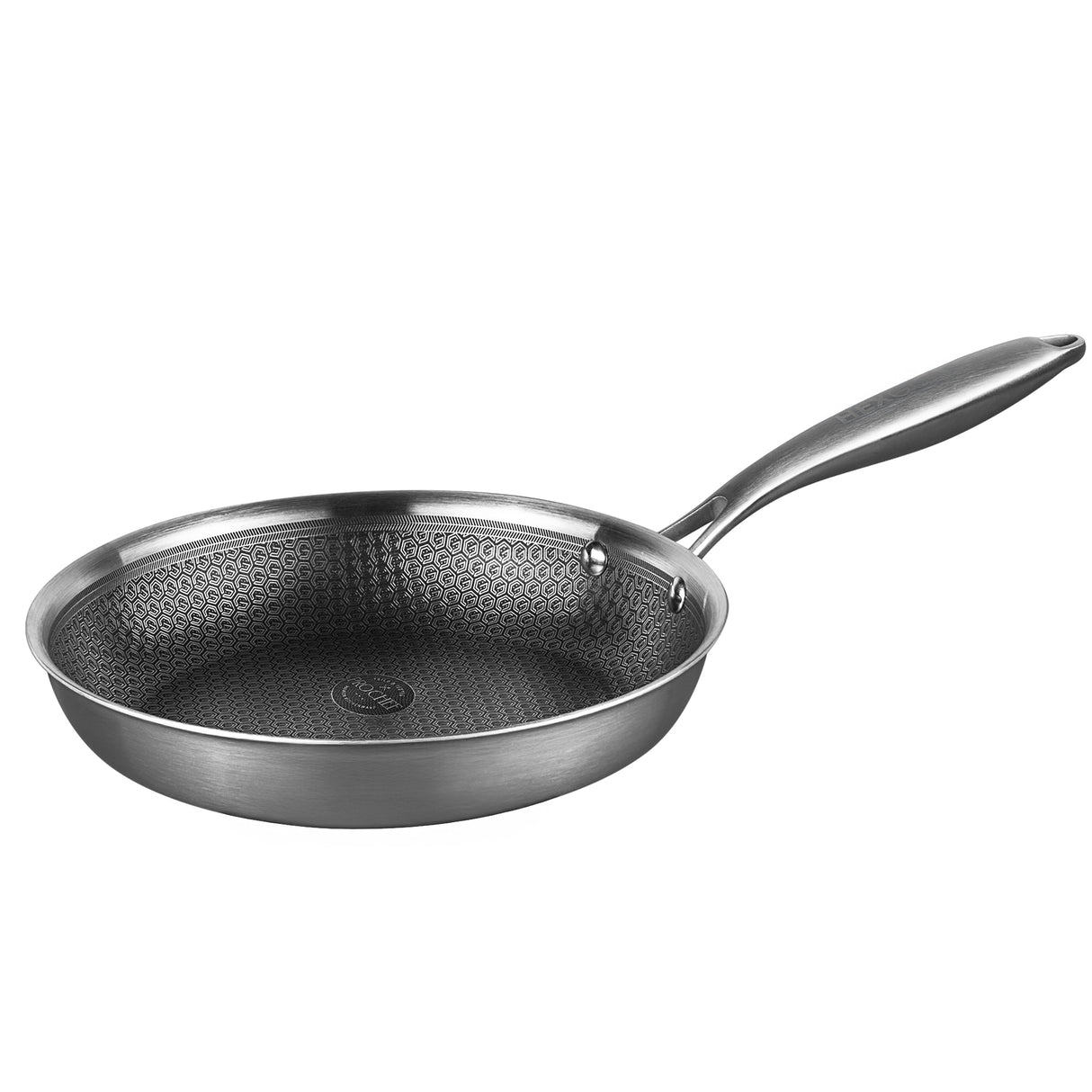 Stainless steel frying pan with textured surface on a white background