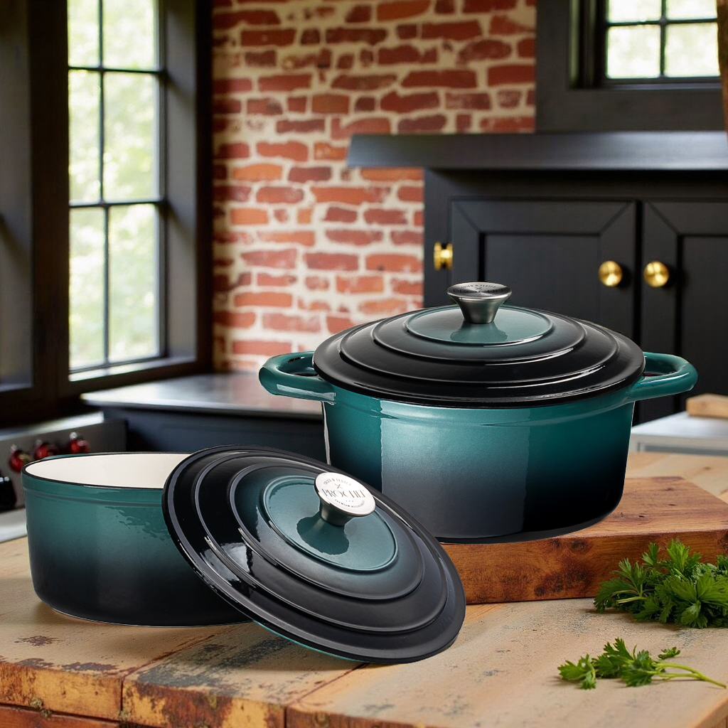 Set of teal enameled cast iron cookware on a wooden surface with a brick wall background.