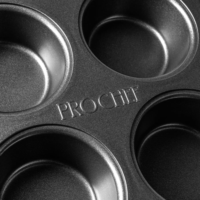 Close-up of a black muffin tin with 'ProChef' branding.