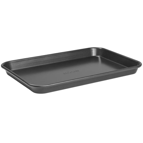 A ProChef black oven tray made of carbon steel with a non-stick coating on the interior and exterior.