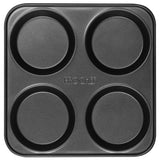 Black 4-cup Yorkshire pudding tray on a white background
