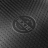 Close-up of Prochef HexGuard non-stick cooking surface with textured hexagonal pattern and Prochef premium kitchenware logo, highlighting durability and design.