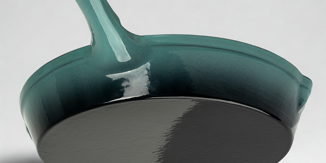 ProChef teal-coloured frying pan on a light grey background